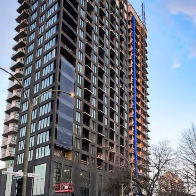 Blue Superchute installed on a high rise.