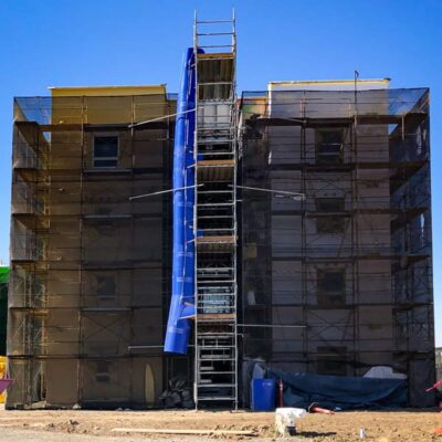 Blue Superchute installed on a scaffold.